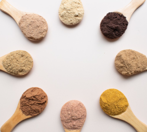 Assortment of plant-based protein powders used for nutritional supplements, natural cosmetics, and functional foods
